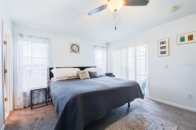 156 Carrera Ave, Davenport, FL 33897 - carpeted bedroom with access to exterior, a ceiling fan, and baseboards