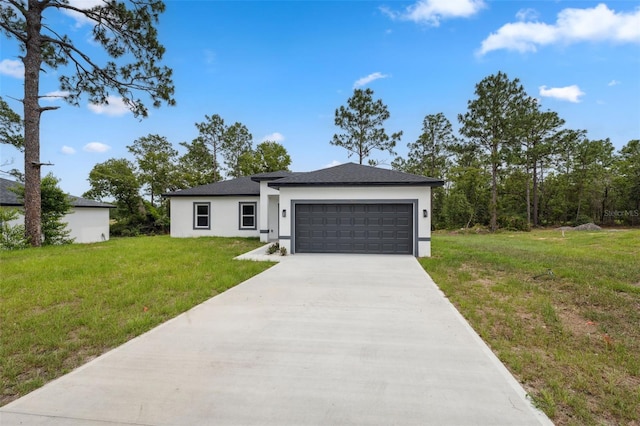 6062 SW 154th Pl, Ocala, FL 34473 - view of front of property with stucco siding, an attached garage, a front yard, and driveway