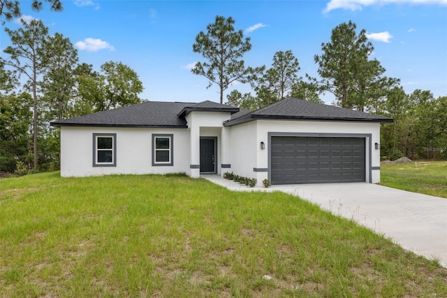 6062 SW 154th Pl, Ocala, FL 34473 - prairie-style house featuring stucco siding, an attached garage, and a front yard