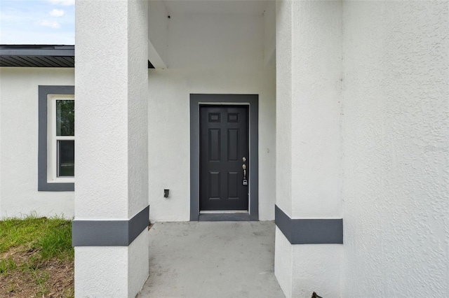 6062 SW 154th Pl, Ocala, FL 34473 - entrance to property with stucco siding