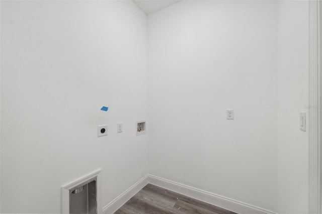 6062 SW 154th Pl, Ocala, FL 34473 - laundry room with hookup for an electric dryer, hookup for a washing machine, dark wood-style floors, and baseboards