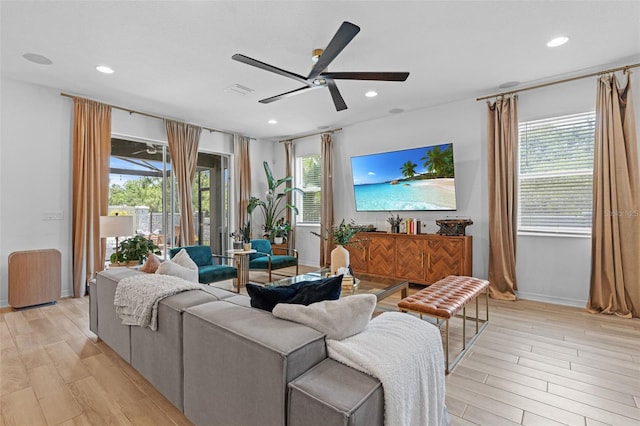 1425 Paget Cv, Sanford, FL 32771 - living area with light wood-style floors, ceiling fan, recessed lighting, and baseboards