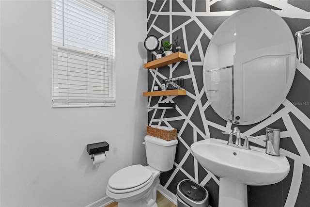 1425 Paget Cv, Sanford, FL 32771 - bathroom featuring toilet and baseboards