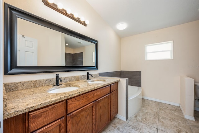 1470 Winston Rd, Maitland, FL 32751 - full bath featuring a tub to relax in, double vanity, and baseboards