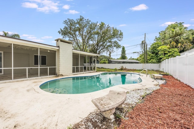 1470 Winston Rd, Maitland, FL 32751 - view of pool featuring a sunroom, a fenced backyard, and a patio area