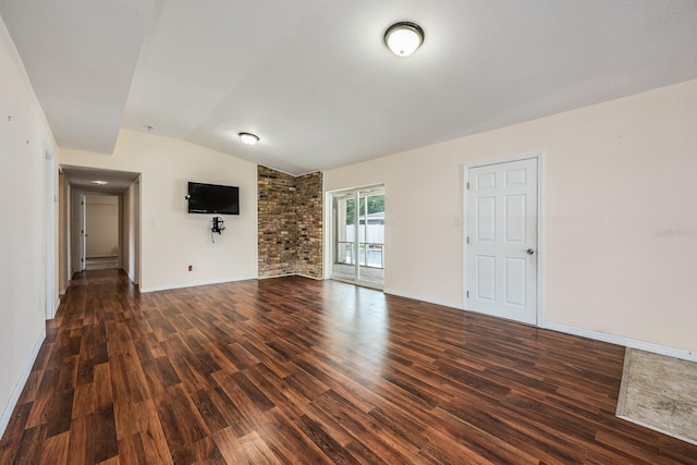 1470 Winston Rd, Maitland, FL 32751 - unfurnished living room featuring vaulted ceiling, wood finished floors, and baseboards