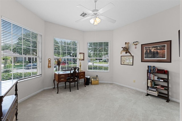 2026 Winding Oaks Dr, Orlando, FL 32825 - carpeted office with plenty of natural light, a ceiling fan, and baseboards