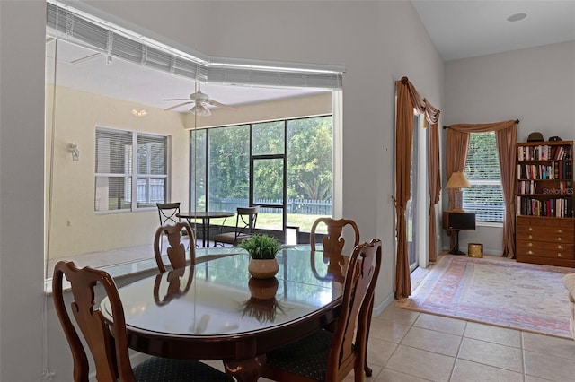 2026 Winding Oaks Dr, Orlando, FL 32825 - dining room featuring healthy amount of natural light, light tile patterned floors, and ceiling fan
