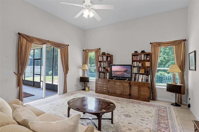 2026 Winding Oaks Dr, Orlando, FL 32825 - living room with healthy amount of natural light, ceiling fan, and baseboards
