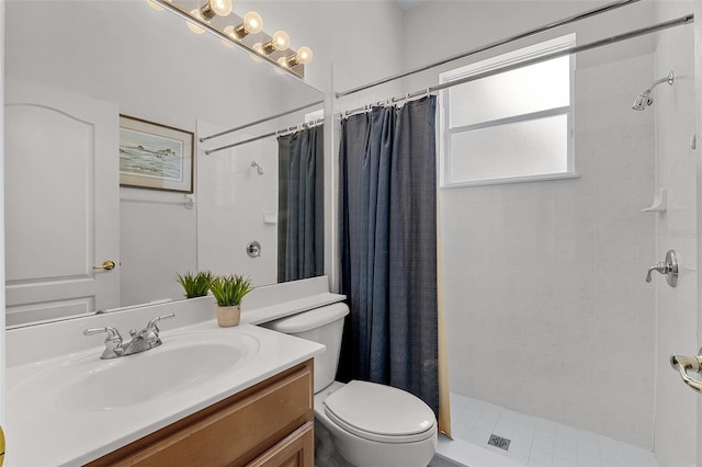 2026 Winding Oaks Dr, Orlando, FL 32825 - bathroom featuring toilet, vanity, and a tile shower
