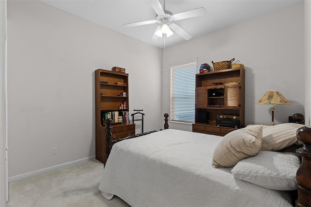 2026 Winding Oaks Dr, Orlando, FL 32825 - bedroom featuring light carpet, baseboards, and a ceiling fan