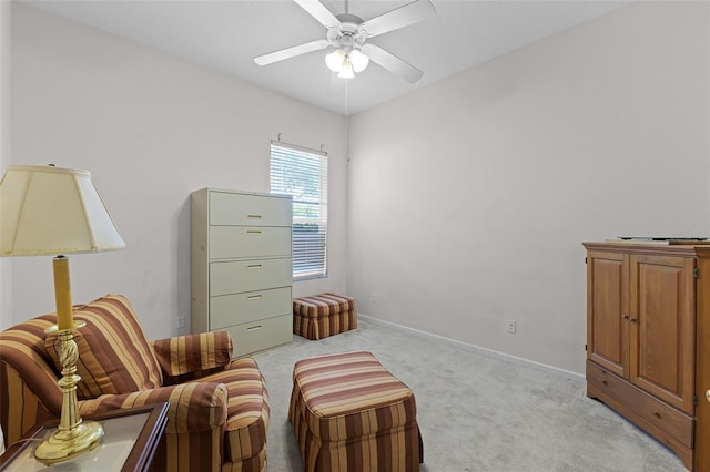 2026 Winding Oaks Dr, Orlando, FL 32825 - living area with light colored carpet, a ceiling fan, and baseboards