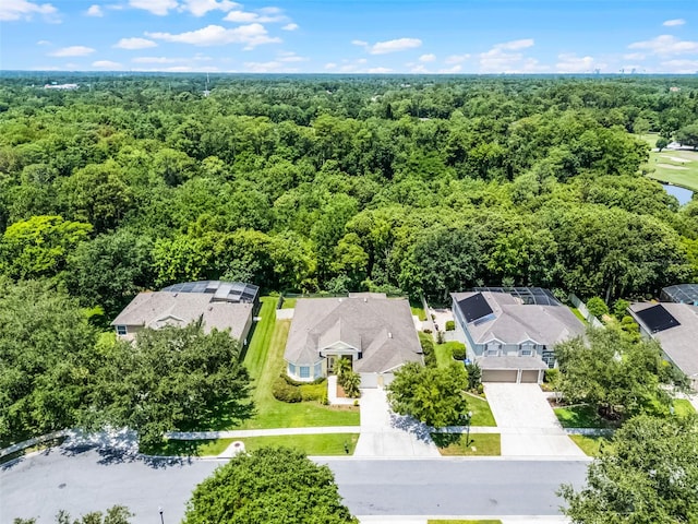 2026 Winding Oaks Dr, Orlando, FL 32825 - aerial view of residential area with a forest