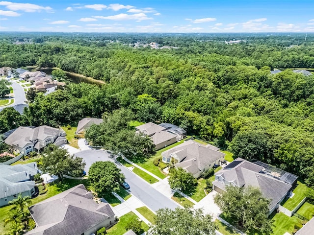 2026 Winding Oaks Dr, Orlando, FL 32825 - aerial perspective of suburban area featuring a heavily wooded area