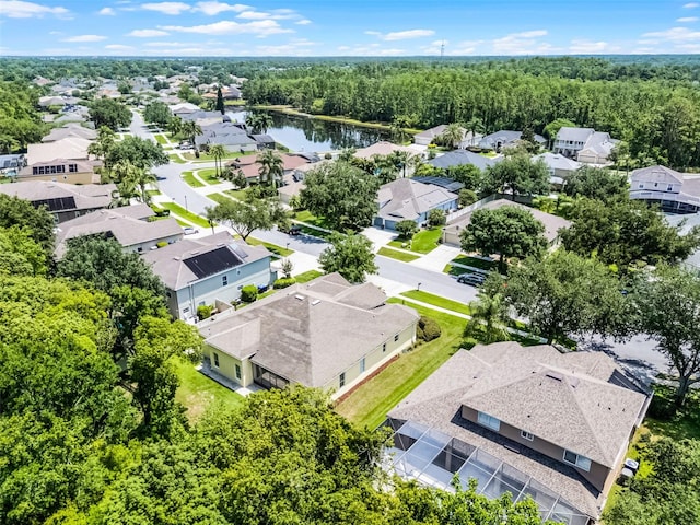 2026 Winding Oaks Dr, Orlando, FL 32825 - aerial perspective of suburban area with a large body of water and a heavily wooded area