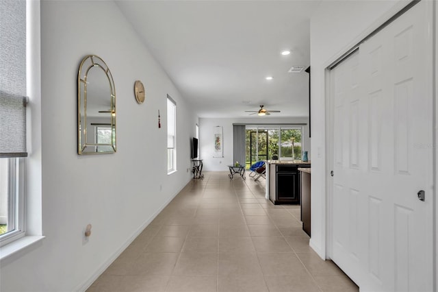14325 Hidden Ct, Clermont, FL 34711 - corridor with recessed lighting and light tile patterned flooring