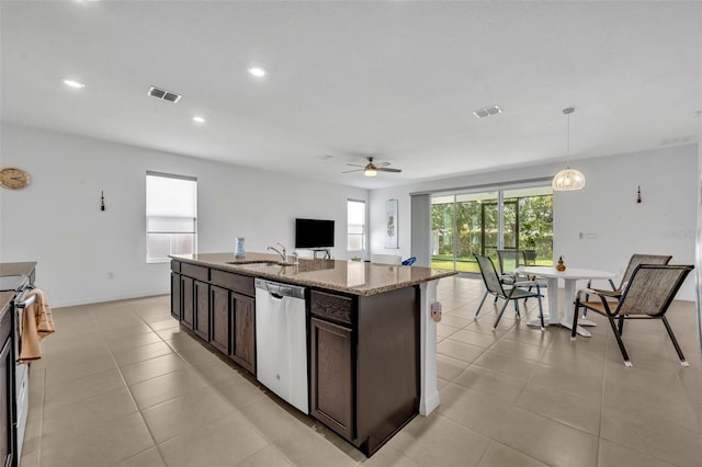 14325 Hidden Ct, Clermont, FL 34711 - kitchen with appliances with stainless steel finishes, a sink, dark brown cabinetry, recessed lighting, and a ceiling fan