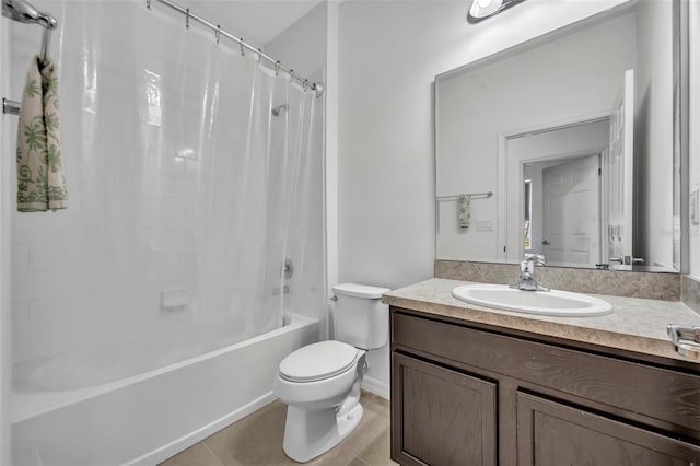 14325 Hidden Ct, Clermont, FL 34711 - bathroom featuring toilet, vanity, shower / bath combo, and tile patterned flooring