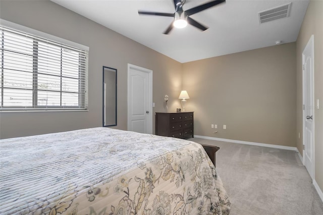 2936 Econ Landing Blvd, Orlando, FL 32825 - carpeted bedroom featuring baseboards and a ceiling fan