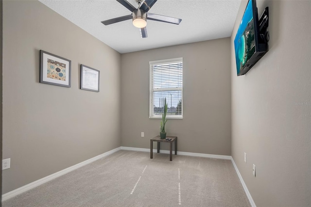 2936 Econ Landing Blvd, Orlando, FL 32825 - unfurnished room featuring ceiling fan, carpet floors, baseboards, and a textured ceiling