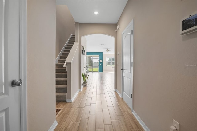 2936 Econ Landing Blvd, Orlando, FL 32825 - foyer entrance featuring a ceiling fan, stairs, baseboards, light wood finished floors, and recessed lighting