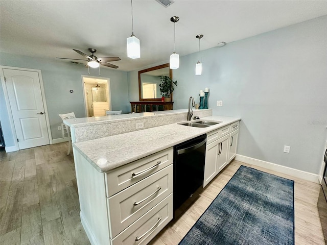 200 S Banana River Blvd Unit 703, Cocoa Beach, FL 32931 - kitchen featuring a sink, dishwasher, a peninsula, a ceiling fan, and baseboards