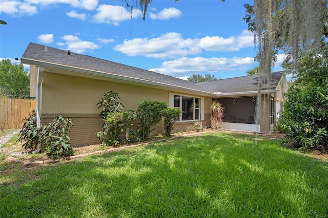 3362 Partridge St, Deltona, FL 32738 - back of property with brick siding, a sunroom, and stucco siding