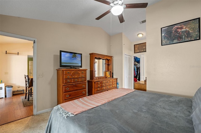 3362 Partridge St, Deltona, FL 32738 - bedroom with vaulted ceiling, light carpet, ceiling fan, and a closet
