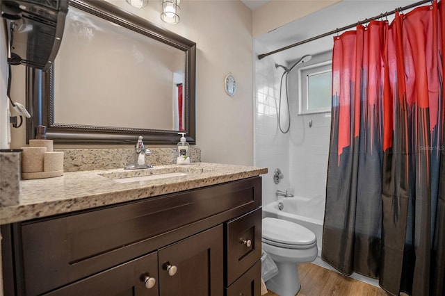 3362 Partridge St, Deltona, FL 32738 - full bath with vanity, toilet, shower / bath combination with curtain, and wood finished floors