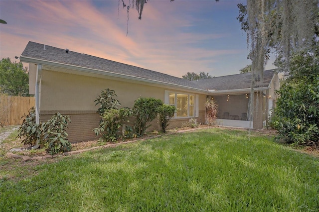 3362 Partridge St, Deltona, FL 32738 - ranch-style home with brick siding, a sunroom, and stucco siding