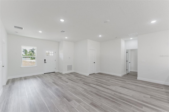 17434 SW 36th Avenue Rd, Ocala, FL 34473 - empty room featuring light wood-style floors, recessed lighting, and baseboards