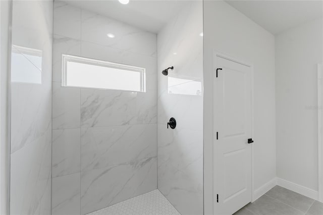 17434 SW 36th Avenue Rd, Ocala, FL 34473 - bathroom featuring a marble finish shower and tile patterned floors