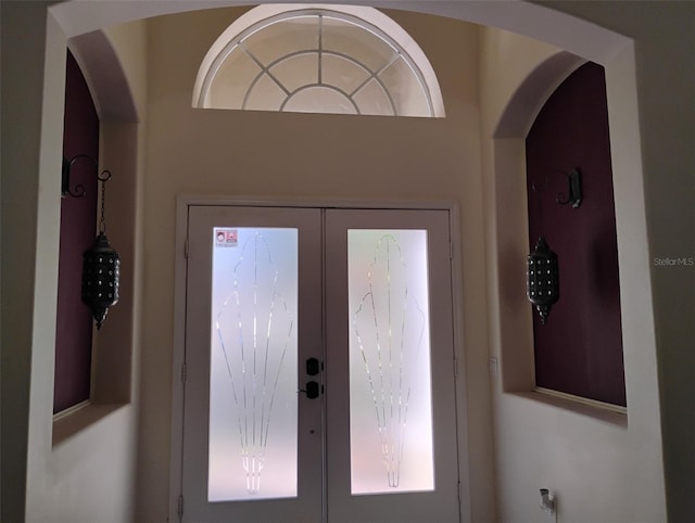 10415 Lucaya Dr, Tampa, FL 33647 - entrance foyer featuring arched walkways and french doors