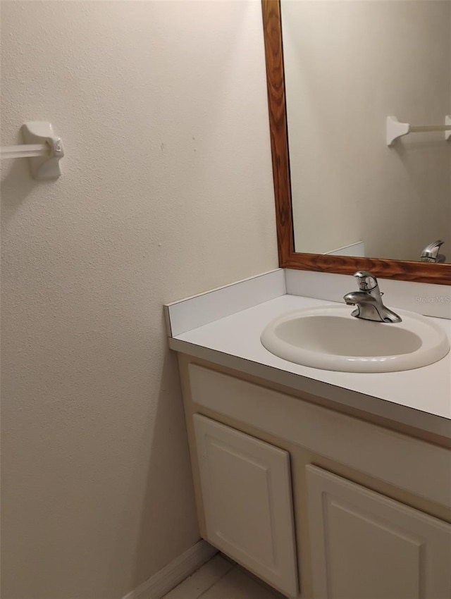 10415 Lucaya Dr, Tampa, FL 33647 - bathroom with vanity and tile patterned flooring
