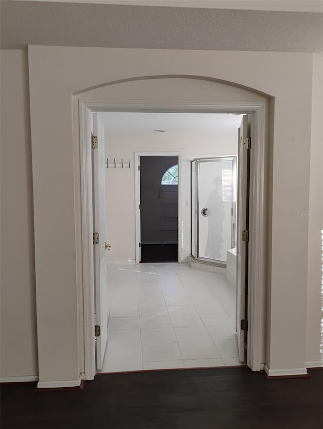 10415 Lucaya Dr, Tampa, FL 33647 - corridor with baseboards and tile patterned flooring