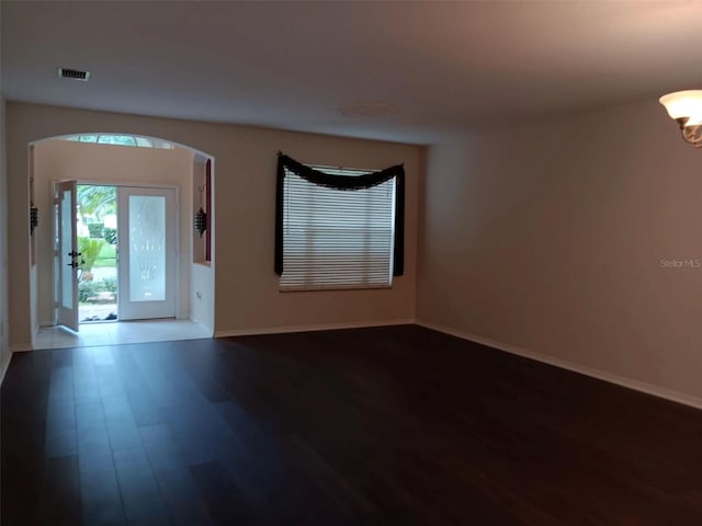 10415 Lucaya Dr, Tampa, FL 33647 - foyer entrance featuring wood finished floors, baseboards, and a chandelier