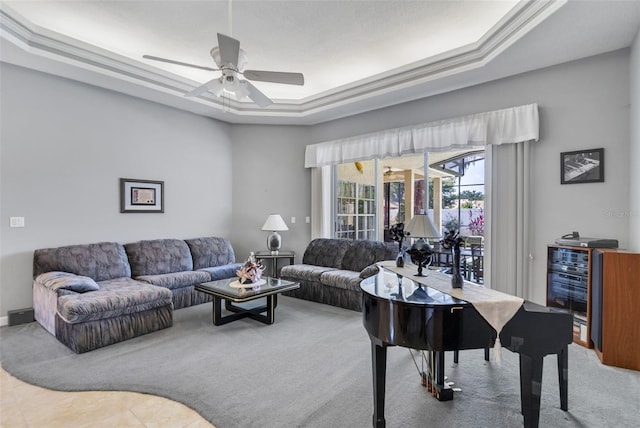 34239 Woodridge Ln, Eustis, FL 32736 - carpeted living room with a tray ceiling and ceiling fan