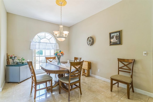 34239 Woodridge Ln, Eustis, FL 32736 - dining space with a chandelier, baseboards, and light tile patterned floors