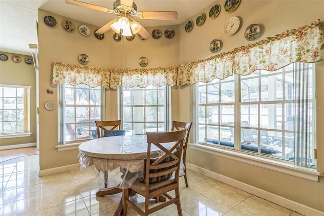 34239 Woodridge Ln, Eustis, FL 32736 - dining room with plenty of natural light, baseboards, and light tile patterned floors