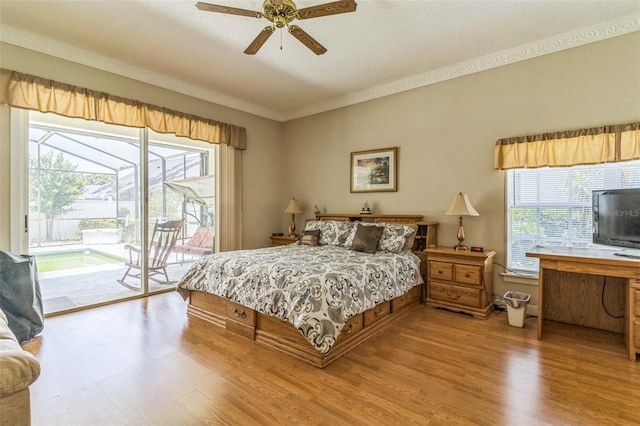34239 Woodridge Ln, Eustis, FL 32736 - bedroom with access to exterior, wood finished floors, crown molding, and ceiling fan