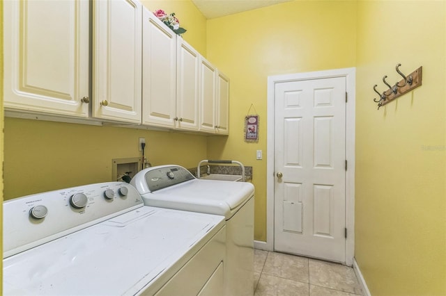 34239 Woodridge Ln, Eustis, FL 32736 - laundry room featuring cabinet space, independent washer and dryer, baseboards, and light tile patterned floors