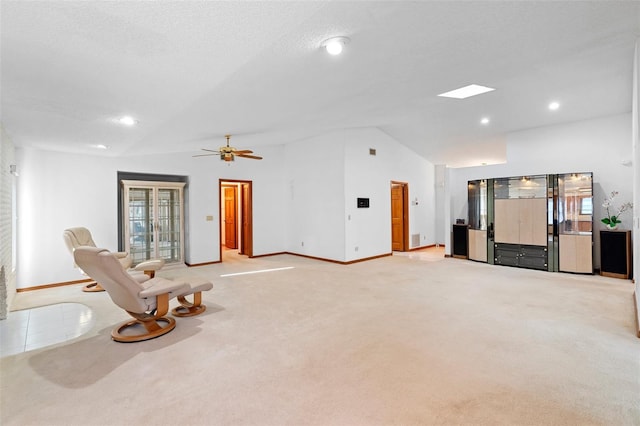 2018 N Normandy Blvd, Deltona, FL 32725 - unfurnished living room featuring vaulted ceiling, baseboards, light colored carpet, a ceiling fan, and recessed lighting