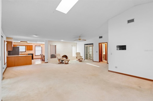 2018 N Normandy Blvd, Deltona, FL 32725 - unfurnished living room featuring light colored carpet and baseboards