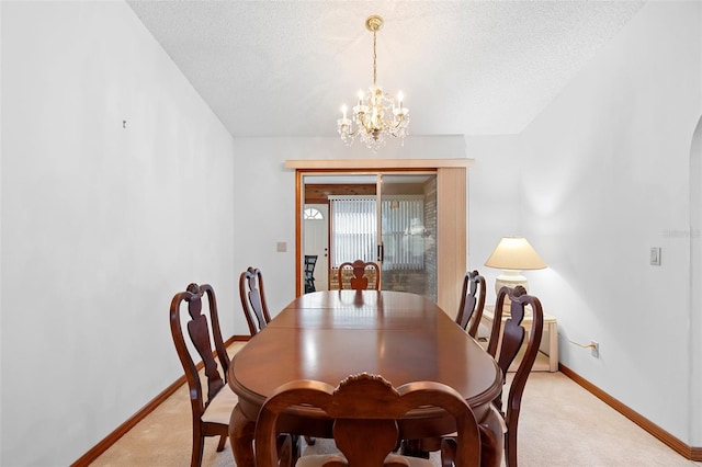 2018 N Normandy Blvd, Deltona, FL 32725 - dining area featuring light colored carpet, baseboards, a chandelier, and a textured ceiling