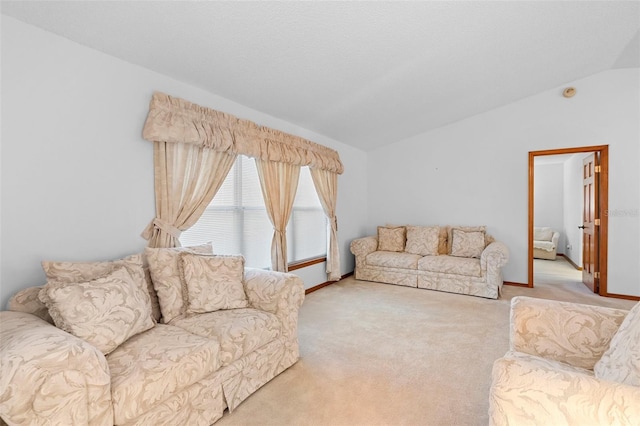 2018 N Normandy Blvd, Deltona, FL 32725 - living area with vaulted ceiling, carpet floors, and baseboards