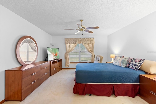 2018 N Normandy Blvd, Deltona, FL 32725 - bedroom with light colored carpet, a textured ceiling, and a ceiling fan