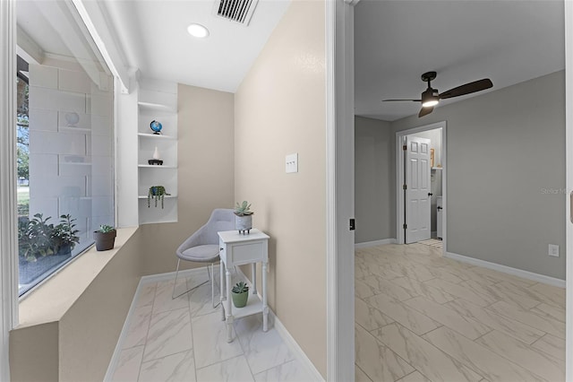 410 W Seminole Ave, Eustis, FL 32726 - hall featuring marble finish floors, baseboards, and recessed lighting