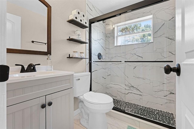 410 W Seminole Ave, Eustis, FL 32726 - full bath featuring a marble finish shower, vanity, toilet, and marble finish flooring