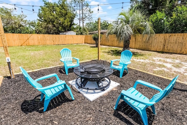 410 W Seminole Ave, Eustis, FL 32726 - view of yard with an outdoor fire pit