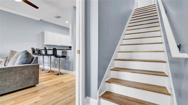 5016 W Lancaster St Unit 00, Tampa, FL 33616 - stairway with wood finished floors, baseboards, ceiling fan, and recessed lighting